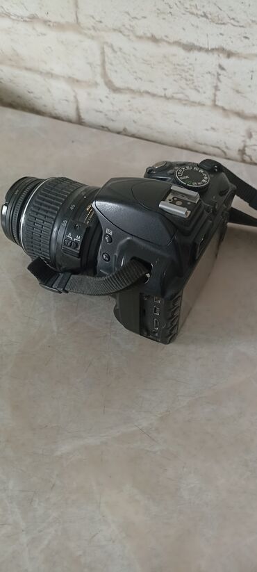 Nikon D3100 с объективом все отлично работает состояние хороший