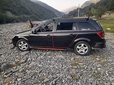 şevralit avtomobil: Opel Astra: 1.3 l | 2006 il Universal — 5
