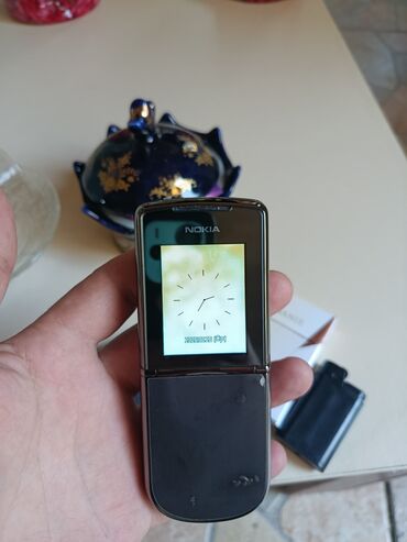 şok çəkən: Nokia 88 00 brend mobil telefon. Qara rəngdədir salafanı sökilmiyib