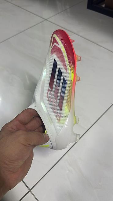 часы: Футбольные бутсы Adidas X Speedflow+ (без шнурков), для игры на — 1