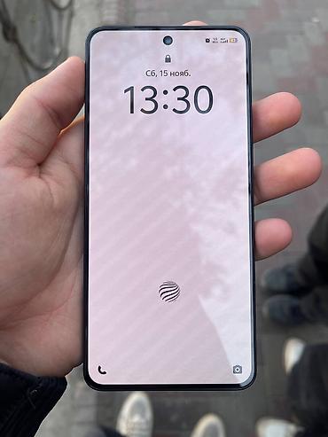 Другие мобильные телефоны: Смартфон с плоскими боковыми гранями и металлической рамкой. Цвет — — 6