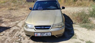 победа машина: Daewoo Nexia N150, седан, золотистый цвет Основные характеристики: -