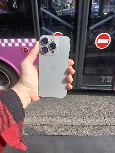 iphone gence: IPhone 15 Pro, Natural Titanium, Face ID — 1