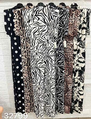 versace: Ženski elegantni kombinezon sa animal printom –2150 din — 8