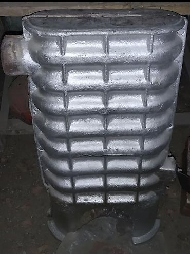 cuqun: Çuqundan hazırlanmış qaz istilik radiatoru/peçi korpusu - ceyran peçi — 1