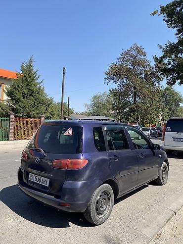 wuling mini ev: Mazda Demio: 2003 г., 1.3 л, Автомат, Бензин, Хэтчбэк — 2