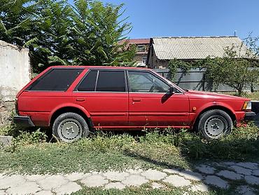 e6 3: Nissan Bluebird: 1986 г., 1.8 л, Механика, Бензин, Универсал — 7