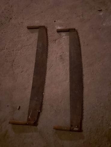 dairəvi mişar: Məhsul: İki ədəd əl mişarı (ağac üçün) Təsvir: - Metal bıçaqlı, hər — 2