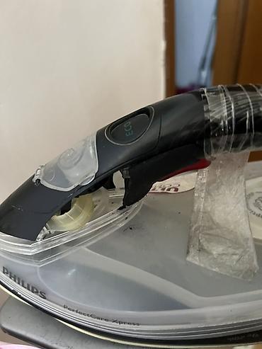 derzi utusu: Philips PerfectCare Xpress “Revolution Ultra Compact” buxarlı ütü Bu — 1