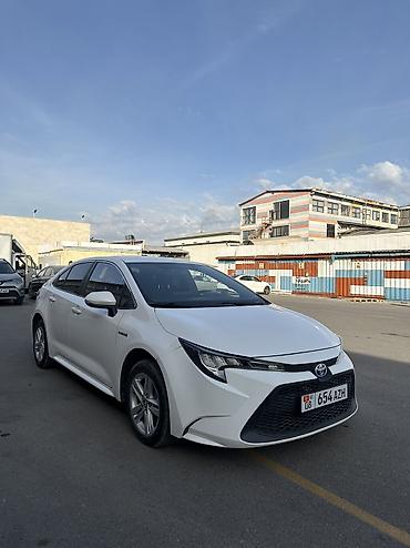 купить витц: Toyota Corolla: 2022 г., 1.8 л, Вариатор, Гибрид, Седан — 8