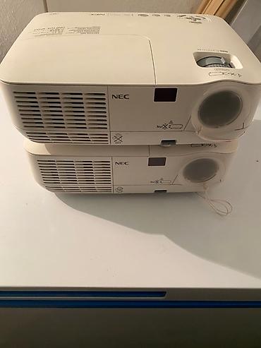 музыкальный плеер: 2 ШТУКИ Проектор NEC NP210 - это компактное и универсальное — 2