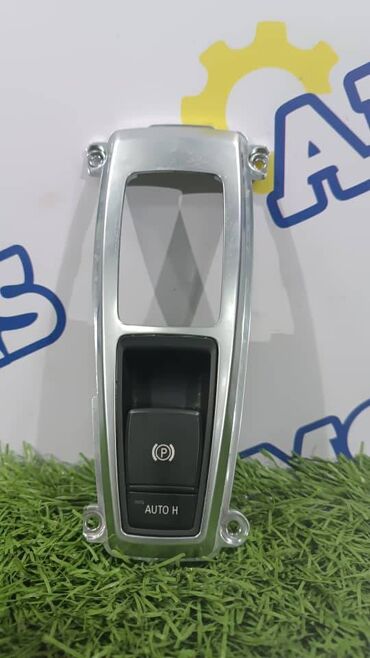 культиватор ручной: BMW X5 E70, кнопка активации ручного тормоза