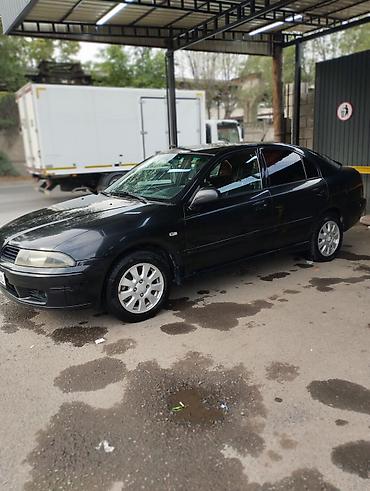 e39 touring: Mitsubishi Carisma: 2004 г., 1.8 л, Механика, Бензин, Хэтчбэк — 2