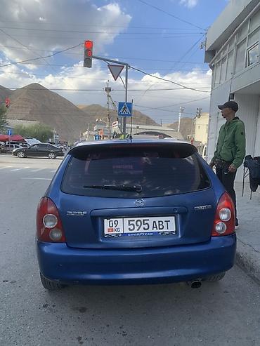 авто пульт: Mazda 323: 2002 г., 1.6 л, Механика, Бензин, Хэтчбэк — 3