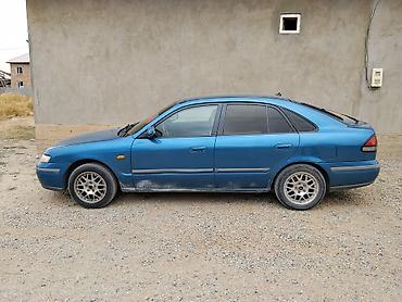 евро маз: Mazda 626: 1997 г., 1.8 л, Механика, Бензин, Седан — 4