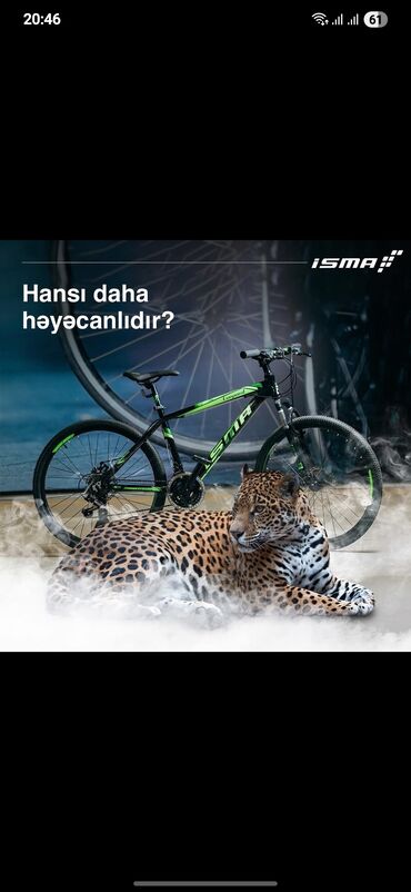 ISMA markalı, qara rəngli, yaşıl detalları olan dağ velosipedi