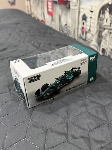 mitsubishi lancer evolution: Aston Martin Formula 1 miniatür model maşın – orijinal qutu içində — 2