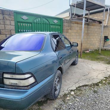 Toyota: Toyota Corolla sedan - Kuzov: 4 qapılı sedan, mavi rəng - Mühərrik — 3