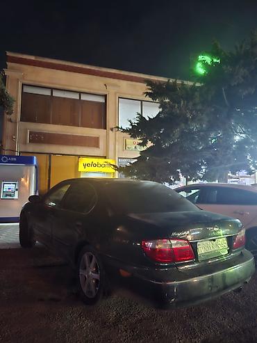 mustan: Nissan Maxima: 3 l | 2006 il Sedan — 9