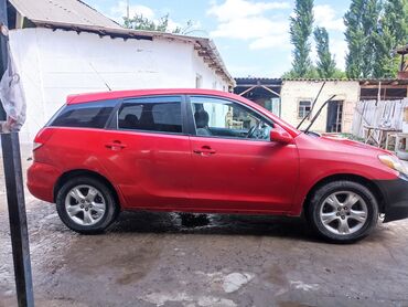 купить двигатель д 245: Автомобиль Toyota Matrix красного цвета с черным передним бампером
