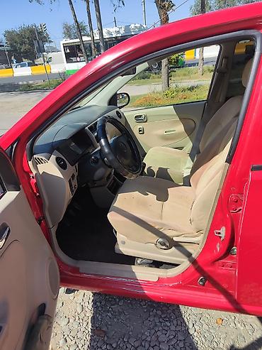 сурочна афто: Daihatsu Cuore: 2007 г., 1 л, Механика, Бензин, Хэтчбэк — 5