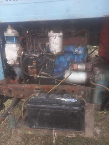 niva siti satilir: Traktor MTZ (Belarus) tipli, 4x4 tam ötürücülü. Mavi rəngli kabinli — 5