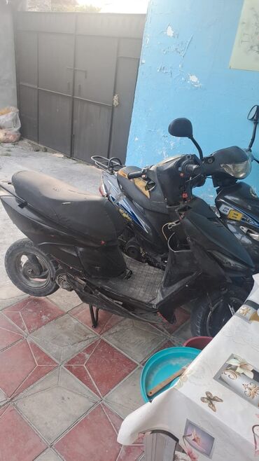 Moto geyim: Moon marka moped işdey vezyetdedir sadece biraz xerc tokmey lazimdir