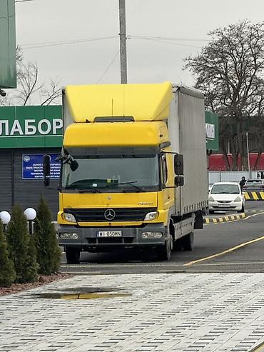 Mercedes-Benz Atego 1222 (желтый кабина, серый тент) 6 ти тонник