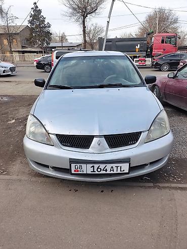 Mitsubishi: Mitsubishi Lancer: 2005 г., 1.3 л, Механика, Бензин, Седан — 1
