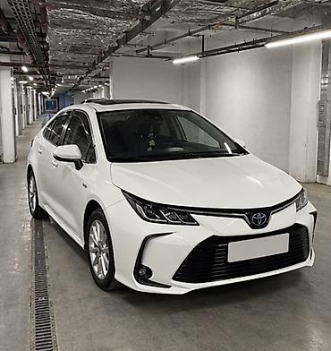 byd e1: Toyota Corolla: 2020 г., 1.8 л, Вариатор, Гибрид, Седан — 6