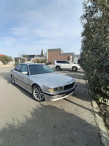 bmw f10 lip: BMW 7 Series sedan (E38), gümüş rəngli, 4 qapılı, arxa ötürücülü — 3