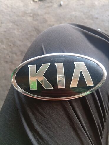 Другие детали кузова: Эмблема KIA для автомобиля - Овальная накладка с логотипом KIA -