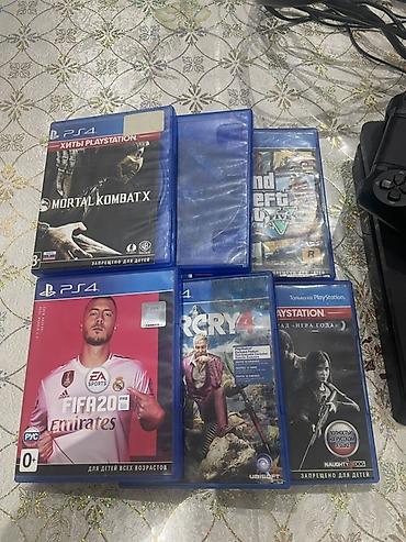 molekul 4: PlayStation 4 Slim oyun konsolu komplekti Paket tərkibi: - PS4 Slim — 5