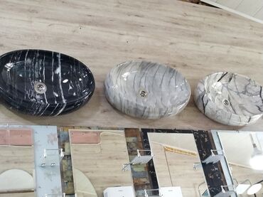 тюльпан: Oval formalı, mərmər teksturalı qara, boz və ağ rənglərdə lavabo