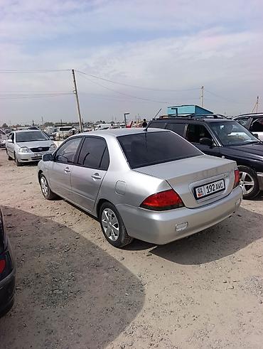 mitsubishi karisma: Mitsubishi Lancer: 2002 г., 1.6 л, Автомат, Газ, Седан — 6