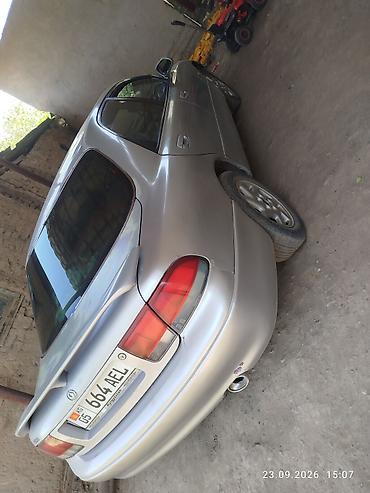 кронос: Mazda 626: 1995 г., 1.8 л, Механика, Бензин, Седан — 4