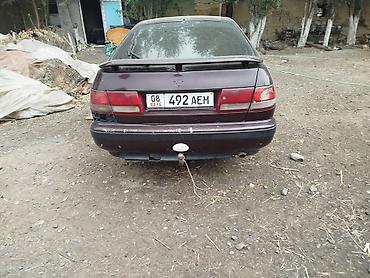 домик машина: Toyota Carina E: 1994 г., Хэтчбэк — 2