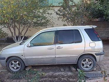 шина ваз: Toyota Raum: 1998 г., 1.5 л, Автомат, Бензин, Минивэн — 2
