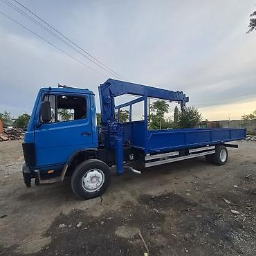 кун погрузчик на мтз: Манипулятор, Mercedes-Benz — 3