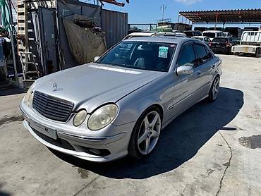 112: Крыло Переднее левое Mercedes-Benz, 2004 г., Б/у, Оригинал — 2