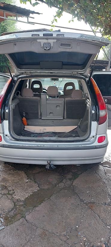 бензавоз: Nissan Almera Tino: 2001 г., Бензин, Минивэн — 4