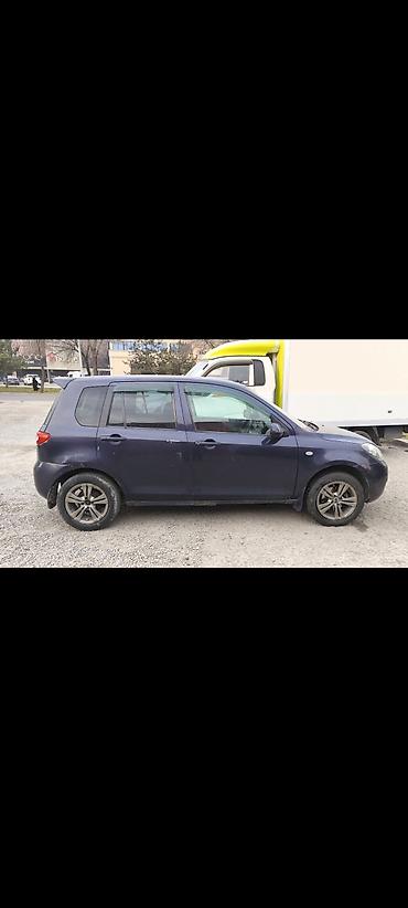 обмен на квартира: Mazda Demio: 2003 г., Автомат, Бензин — 7