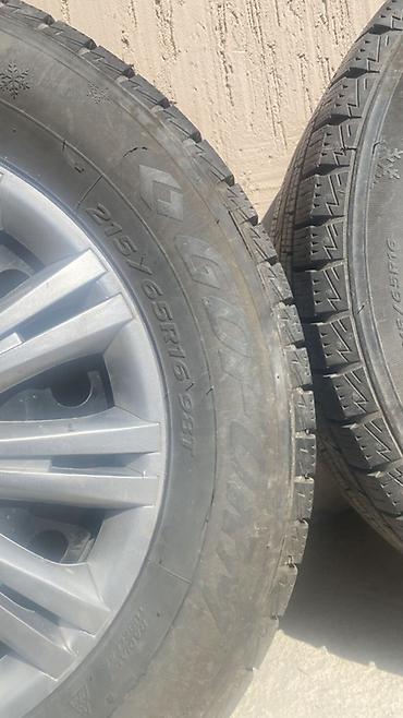 tir: Комплект из 4 зимних колес в сборе: шины + оригинальные колпаки VW. - — 2