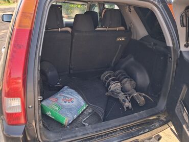 ящик для инструментов в машину: Черный внедорожник Honda CR-V с рейлингами на крыше и запасным