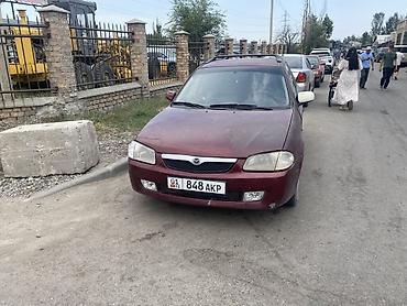 mazda 2000: Mazda 323: 2001 г., 1.6 л, Механика, Бензин, Универсал — 1