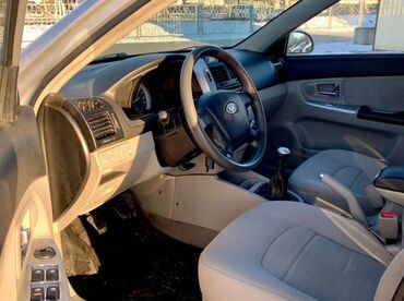 toyota plus c: Kia cerato 2007 salonan alinib herweyi zavadskoydu full salon bele
