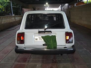 nomre qablari: Lada 2104, ağ rəngli universal kuzov Texniki xüsusiyyətlər: - Kuzov — 1