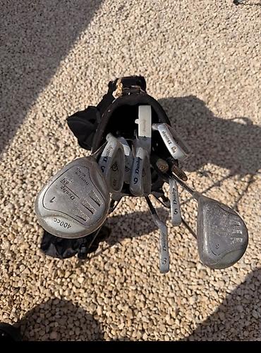 Сумки: Набор для гольфа Dunlop с сумкой-стойкой Состав: - Железные клюшки — 4