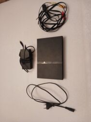 ıkıncı el soyuducu: PlayStation 2 Slim + PES 2014 oyunlar ilə PlayStation 2 Slim satılır