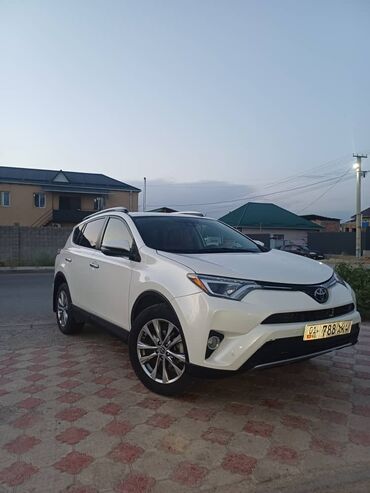 шины на рав 4: Белый внедорожник Toyota RAV4 с глянцевой отделкой и спортивными